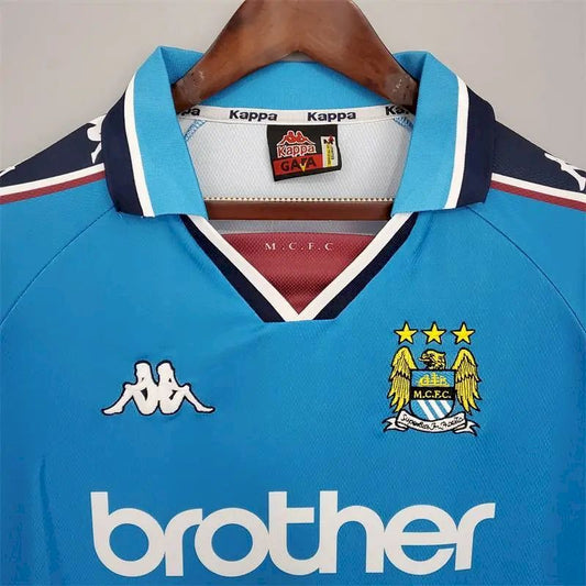 Camisa retrô titular do Manchester City 1997/99