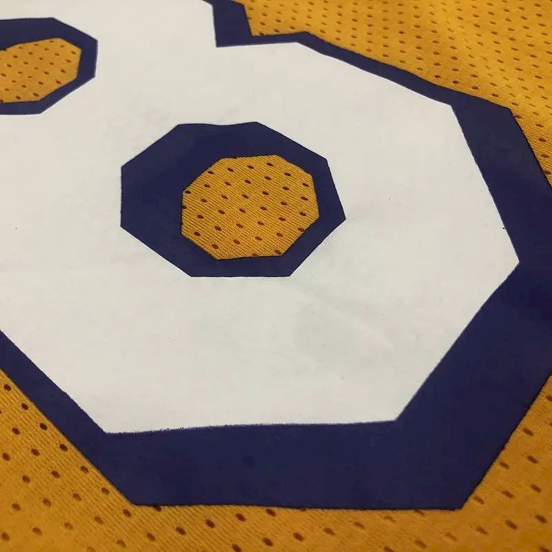 Kobe Bryant Men’s Yellow Player Jersey – Throwback Edition
