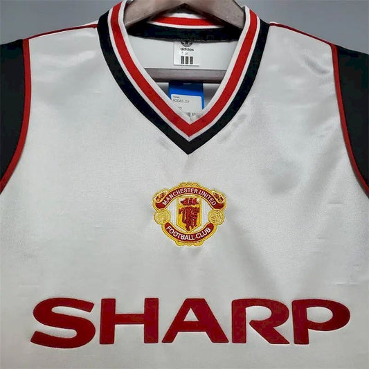 Camisa branca retrô do Manchester United de 1985