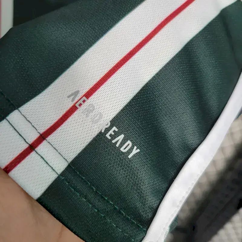 Kit reserva infantil do Manchester United 2023/24