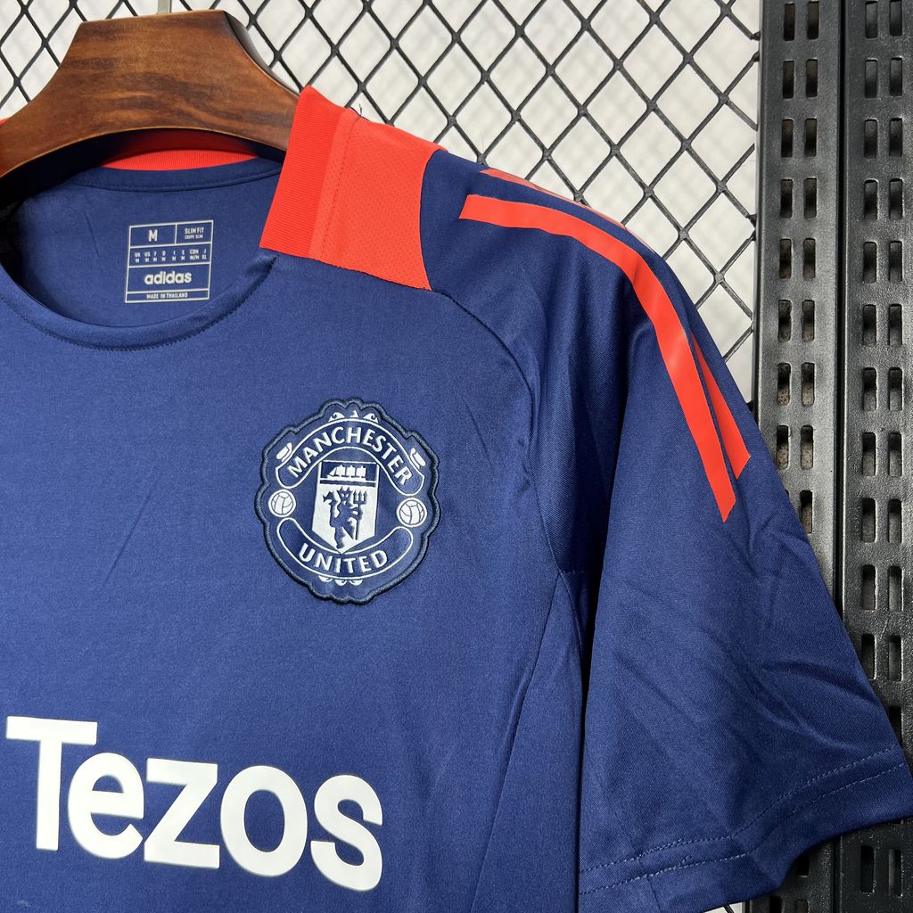 Camisa de treino pré-jogo azul escuro Manchester United 2024/25