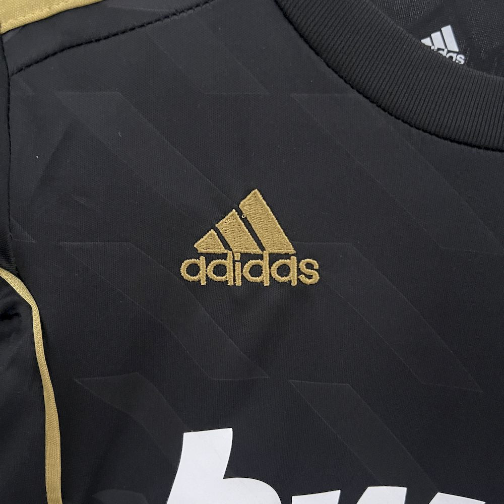 Camisa e shorts retrô infantil do Real Madrid 2011/12