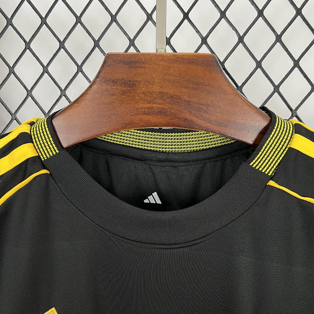 Real Madrid 2025/26 Black And Yellow Special Edition Jersey