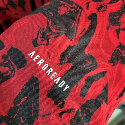 Camisa de treino pré-jogo do Manchester United 2023/24 vermelha e preta