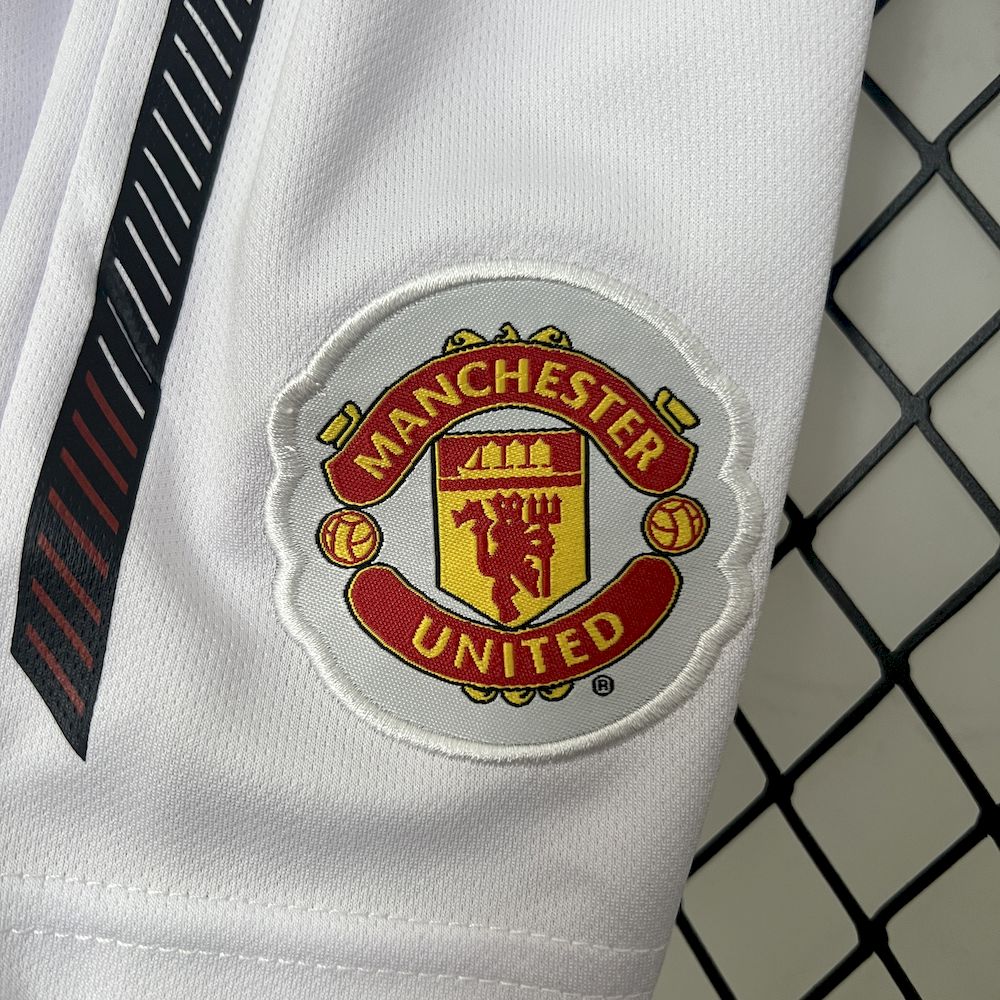 Camisa e shorts retrô infantil Manchester United 2010/11