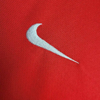 Camisa e shorts retrô infantil do Arsenal 2002/04