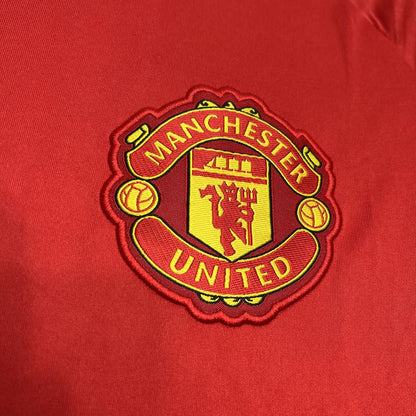 Camisa vermelha pré-jogo Manchester United 2024/25
