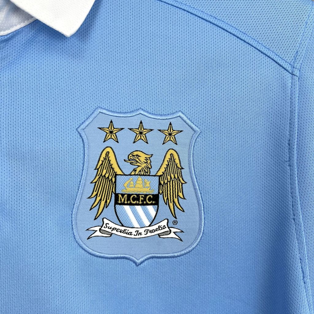 Camisa retrô titular do Manchester City 2015/16