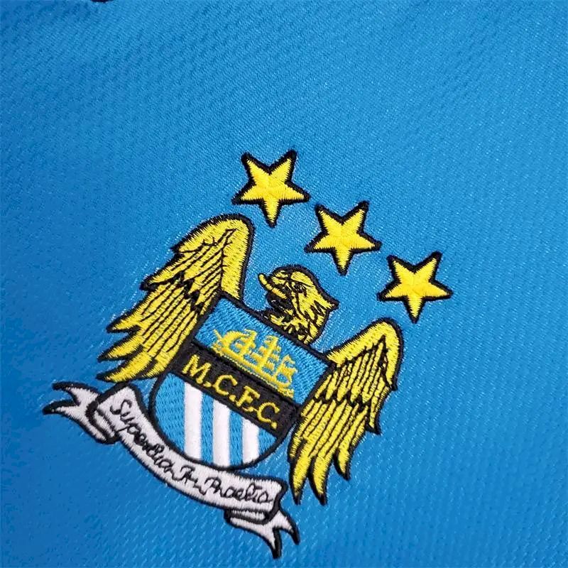Camisa retrô titular do Manchester City 1997/99