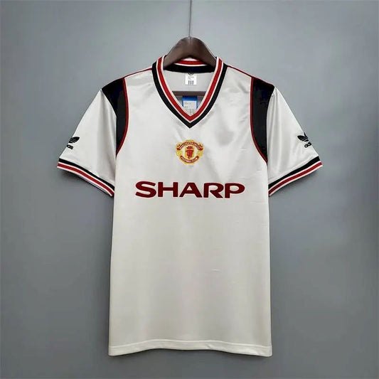 Camisa branca retrô do Manchester United de 1985