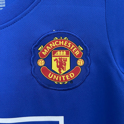 Camisa e shorts retrô infantil do Manchester United 2008/09