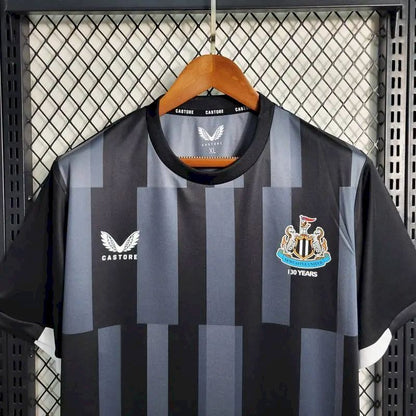 Camisa de treino pré-jogo do Newcastle United 2023/24