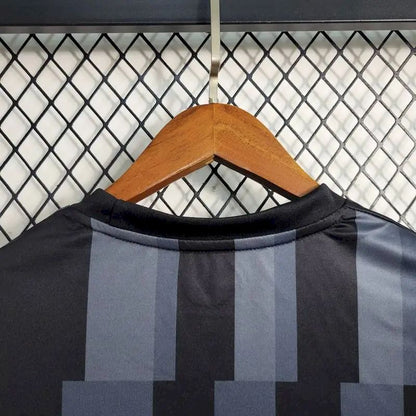 Camisa de treino pré-jogo do Newcastle United 2023/24