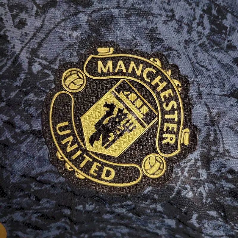 Camisa pré-jogo Stone Roses do Manchester United 2024/25, versão do jogador