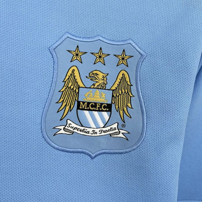 Camisa retrô titular do Manchester City 2013/14