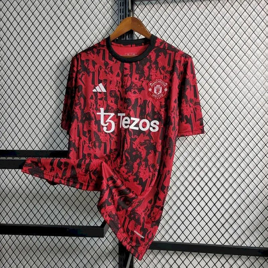 Camisa de treino pré-jogo do Manchester United 2023/24 vermelha e preta