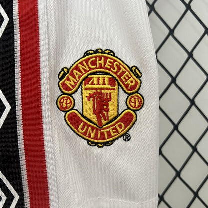 Camisa e shorts retrô infantil Manchester United 1998/99