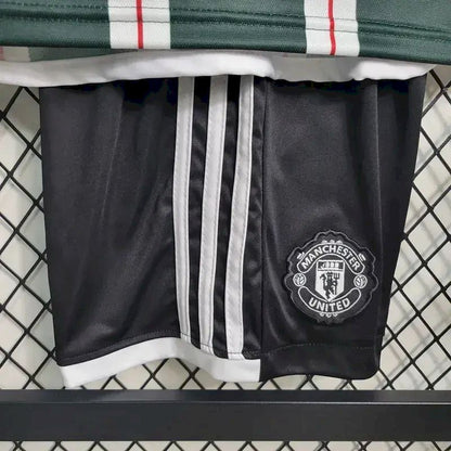 Kit reserva infantil do Manchester United 2023/24