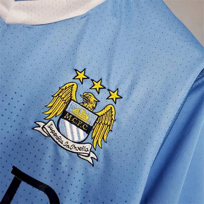 Camisa retrô do Manchester City 2011/12