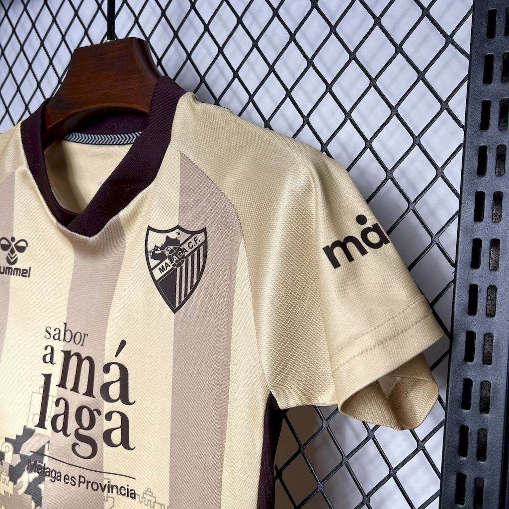 Málaga 2024/25 terceiro kit infantil fora de casa