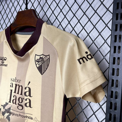 Málaga 2024/25 terceiro kit infantil fora de casa