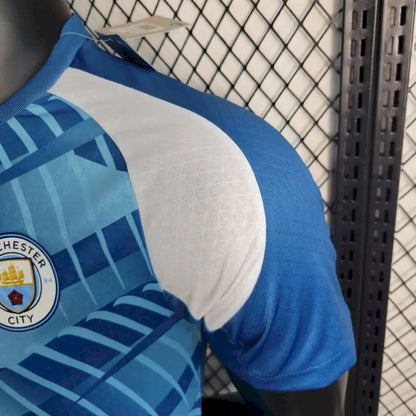Camisa de treino pré-jogo do Manchester City 2023/24, versão jogador
