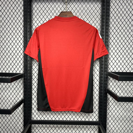 Camisa vermelha pré-jogo Manchester United 2024/25