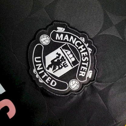 Camisa de treino pré-jogo do Manchester United 2024/25