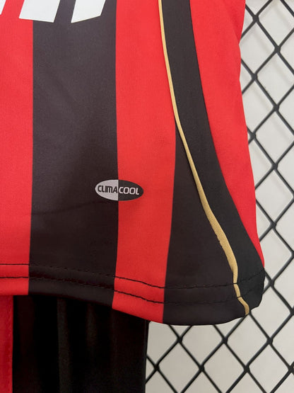 Camisa e shorts retrô infantil do AC Milan 2006/07