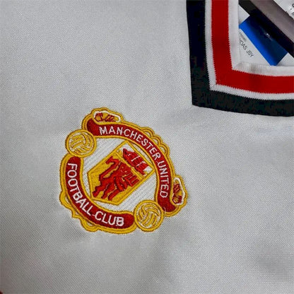 Camisa branca retrô do Manchester United de 1985