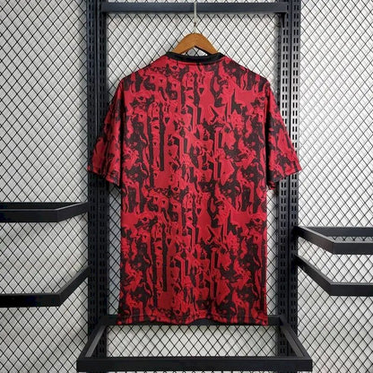 Camisa de treino pré-jogo do Manchester United 2023/24 vermelha e preta
