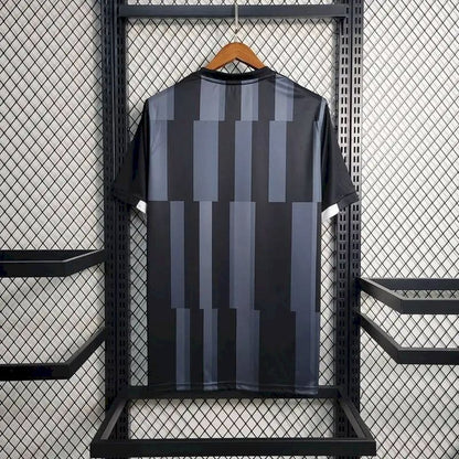 Camisa de treino pré-jogo do Newcastle United 2023/24