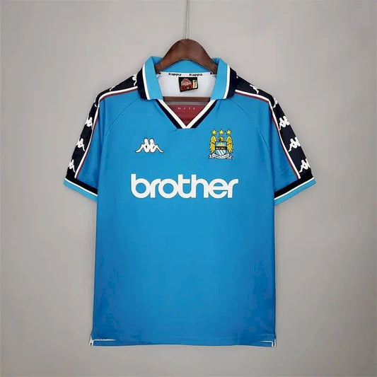 Camisa retrô titular do Manchester City 1997/99