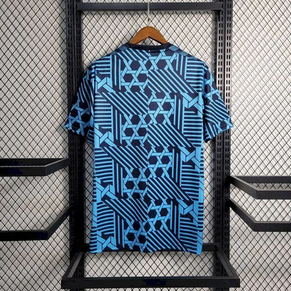 Camisa de treino pré-jogo da Dinamarca 2023/24
