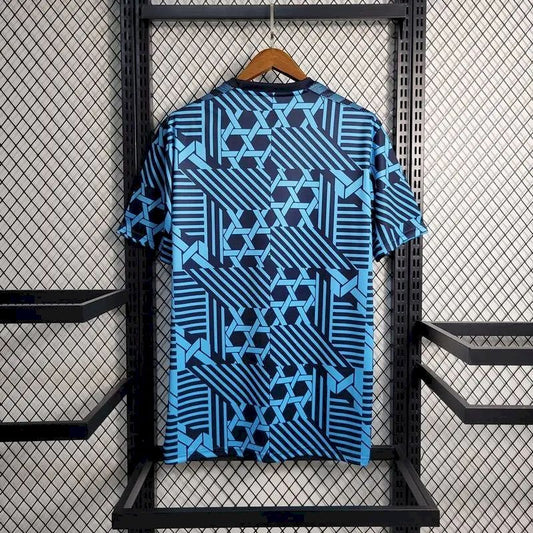 Camisa de treino pré-jogo da Dinamarca 2023/24