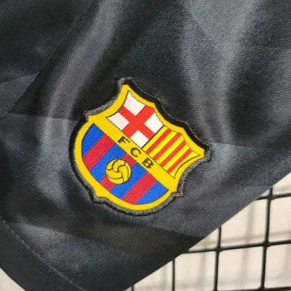 Kit de goleiro infantil preto do Barcelona 2023/24