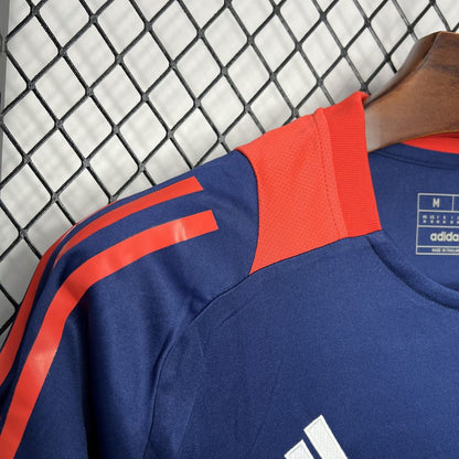 Camisa de treino pré-jogo azul escuro Manchester United 2024/25
