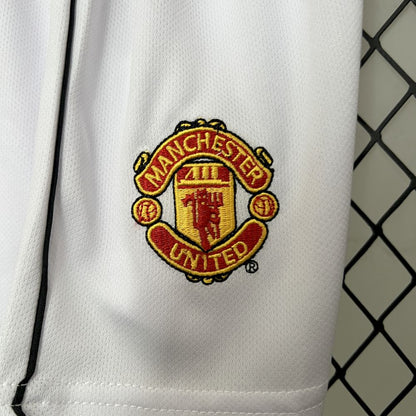 Camisa e shorts retrô infantil Manchester United 2000/02
