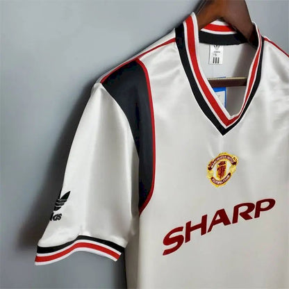 Camisa branca retrô do Manchester United de 1985